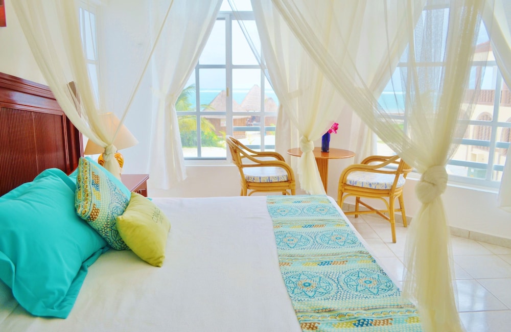

Catania - Puerto Morelos - Corales Suites