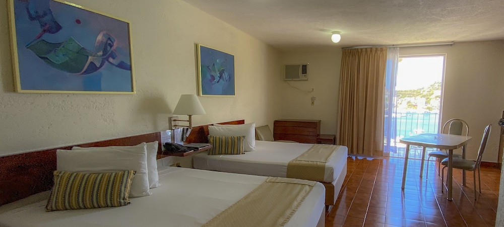 

Milano - Acapulco - Alba Suites Acapulco