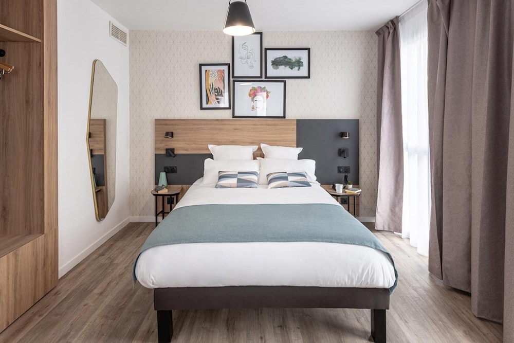 

Milano - Poissy - Appart'City Collection Saint Germain en Laye