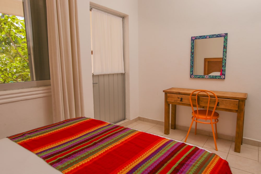 

Bologna - Cozumel - Hotel Villas Colibrí Suites & Bungalows