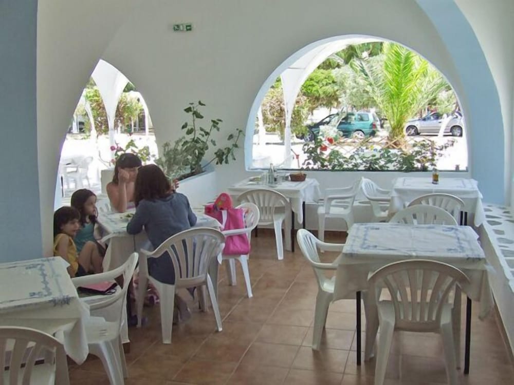 

Milano - Naousa, Paros - Surfing Beach Village Paros
