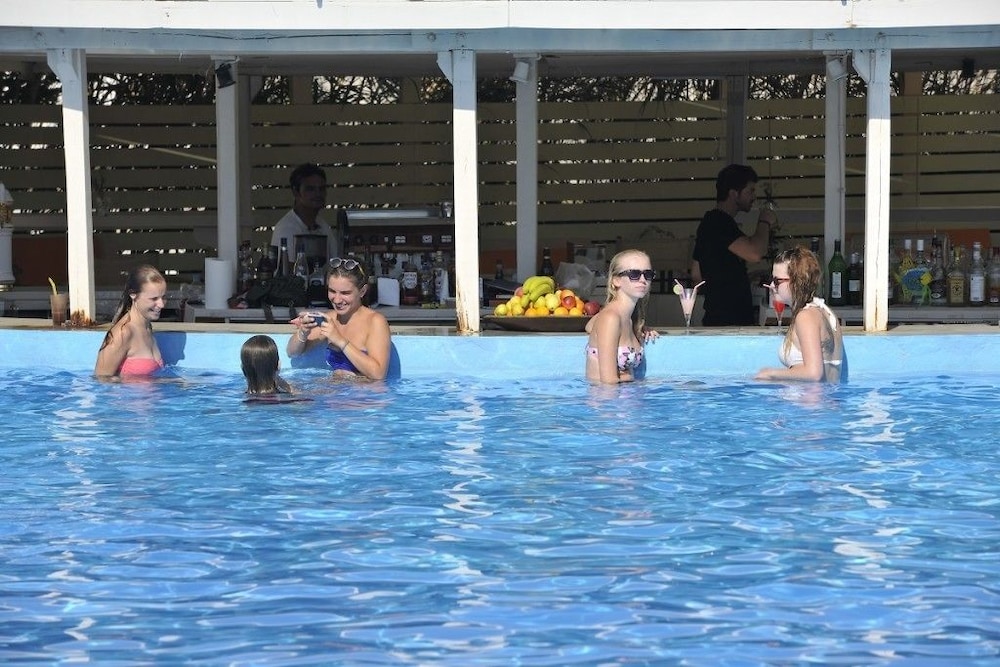 

Roma - Naousa, Paros - Surfing Beach Village