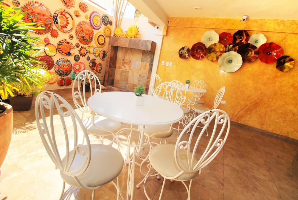 

Bologna - Playa del Carmen - Papagayo Hotel Boutique