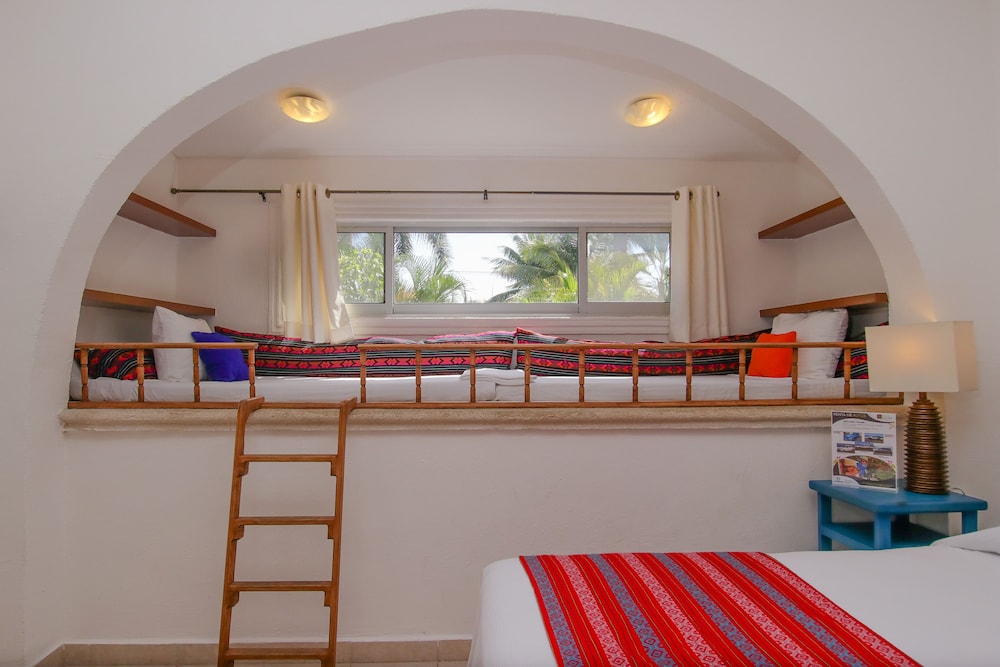 

Milano - Cozumel - Hotel Villas Colibrí Suites & Bungalows