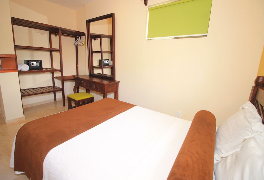 

Catania - Playa del Carmen - Papagayo Hotel Boutique