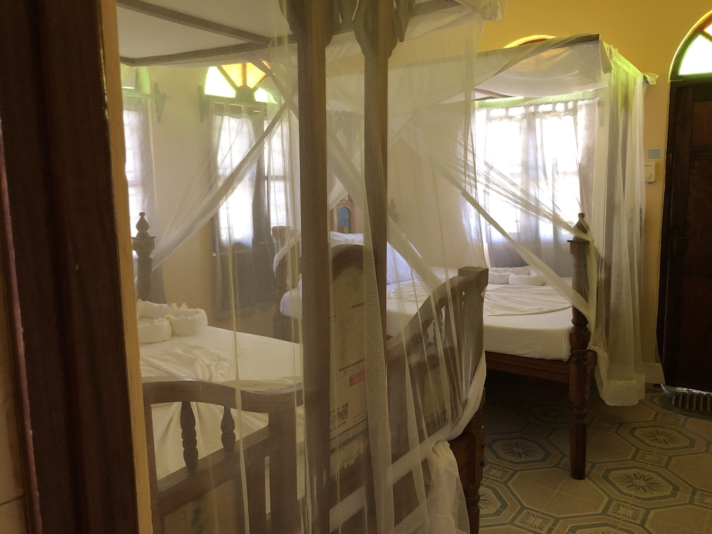 

Napoli - Paje - Blue Earth Beach Bungalows