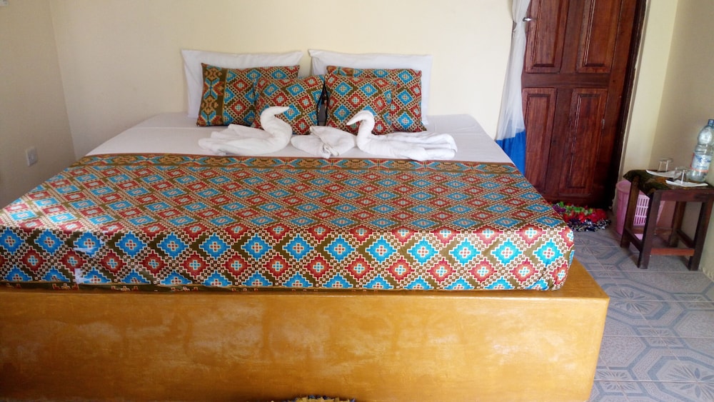 

Bari - Paje - Blue Earth Beach Bungalows