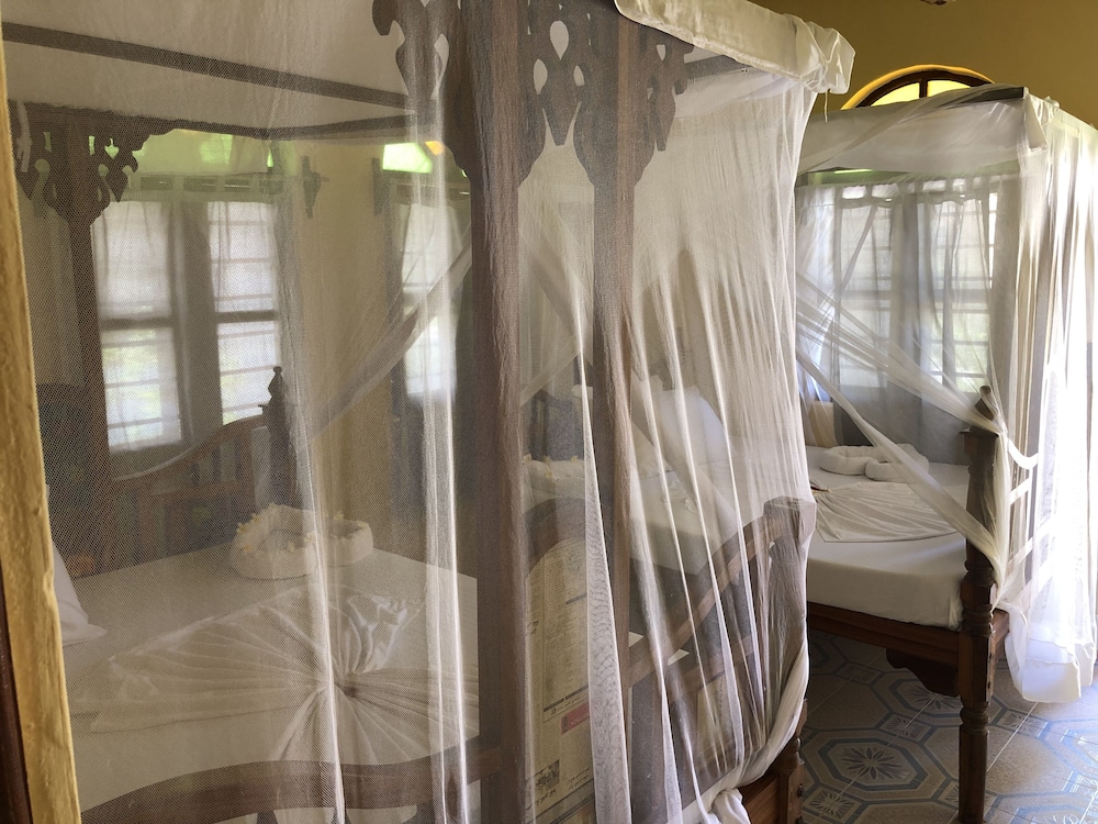 

Napoli - Paje - Blue Earth Beach Bungalows