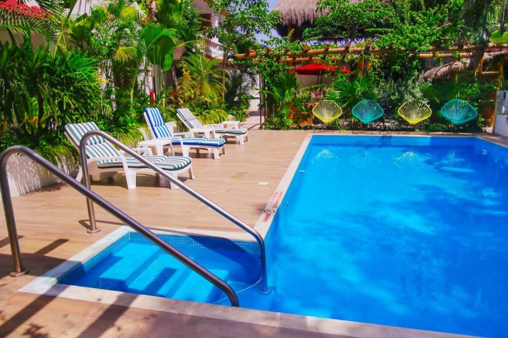 

Roma - Cozumel - Villas Colibri Cozumel & Bungalows