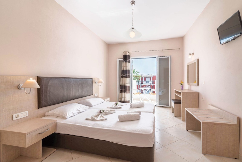 

Milano - Agios Kirikos - Yakinthos Hotel