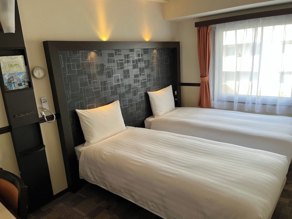 

Milano - Haneda - Toyoko Inn Tokyo Shinagawa Konan-guchi Tennozu Isle