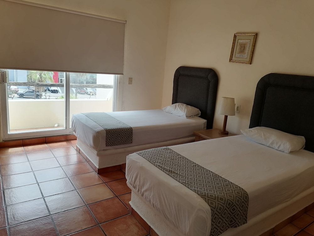 

Roma - San José del Cabo - Suites Las Palmas