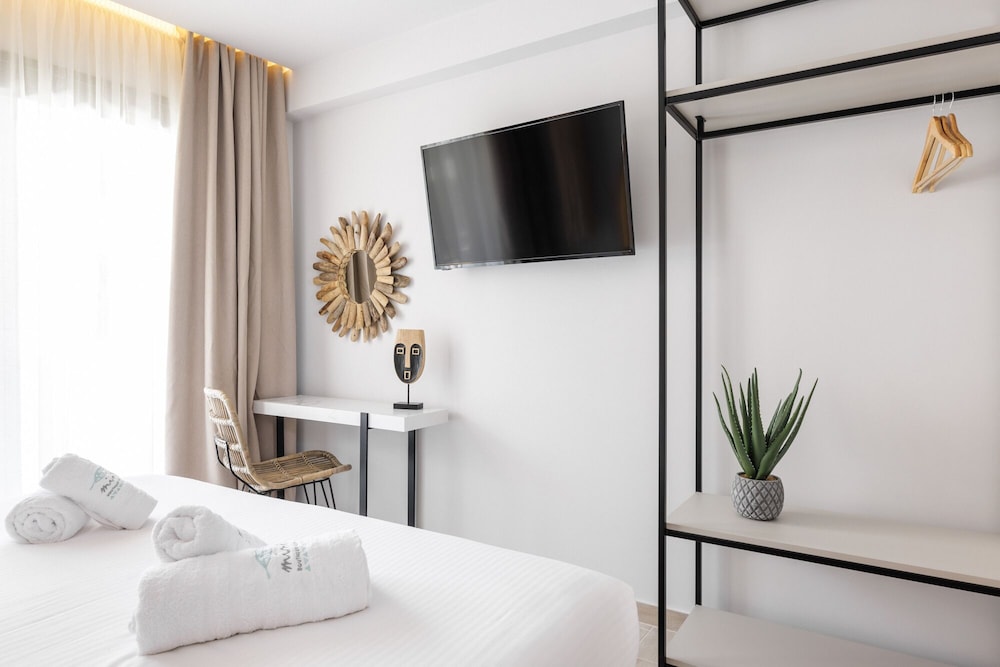

Milano - Polychrono - Amalthia Luxury Suites
