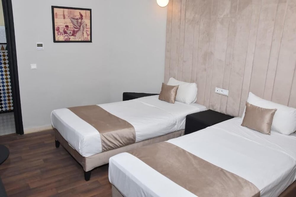

Catania - Casablanca - Cadé Hotel