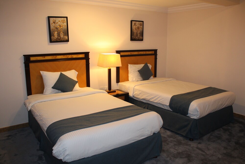 

Milano - Sarūq - Garden Hotel Muscat