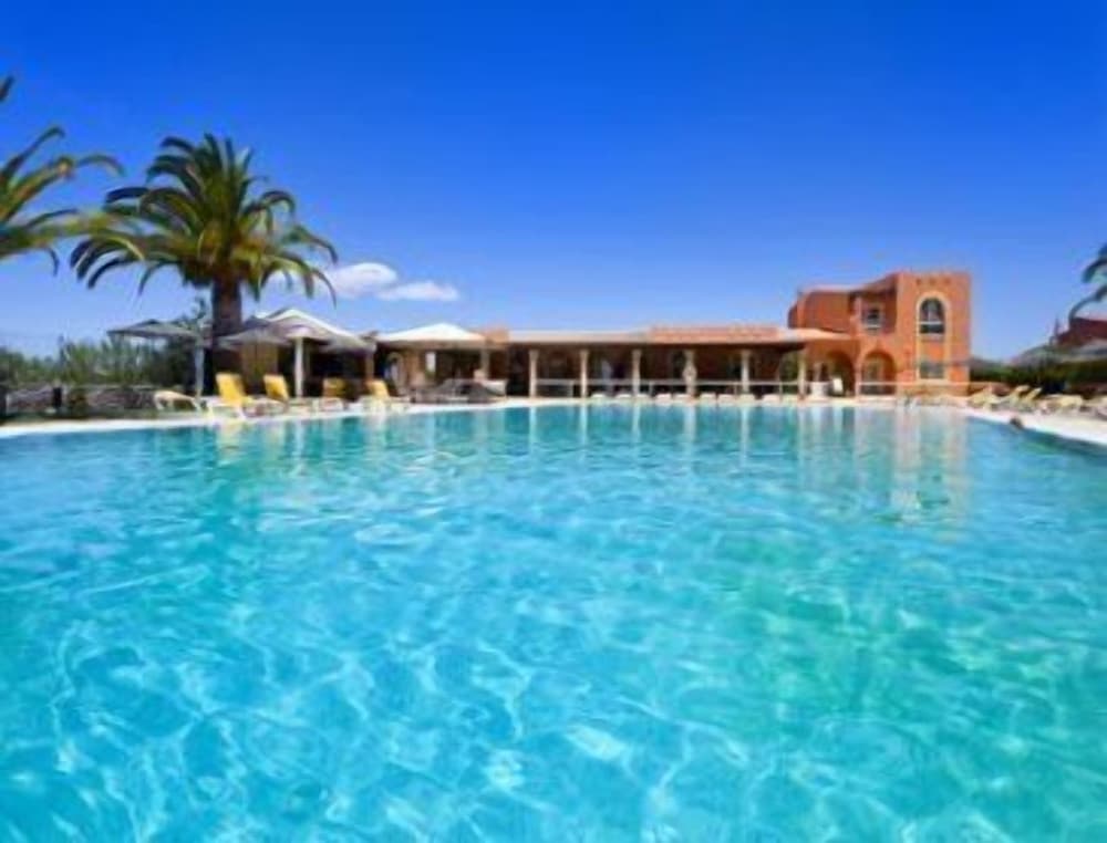 

Milano - Lagoa - Colina Village