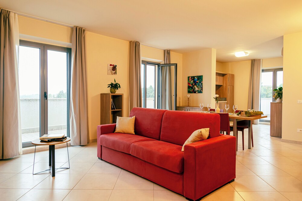 

Olbia - Siena - Tuscasì Aparthotel