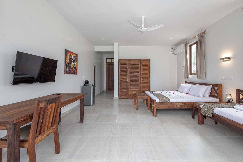 

Catania - Msambweni - YU Resort