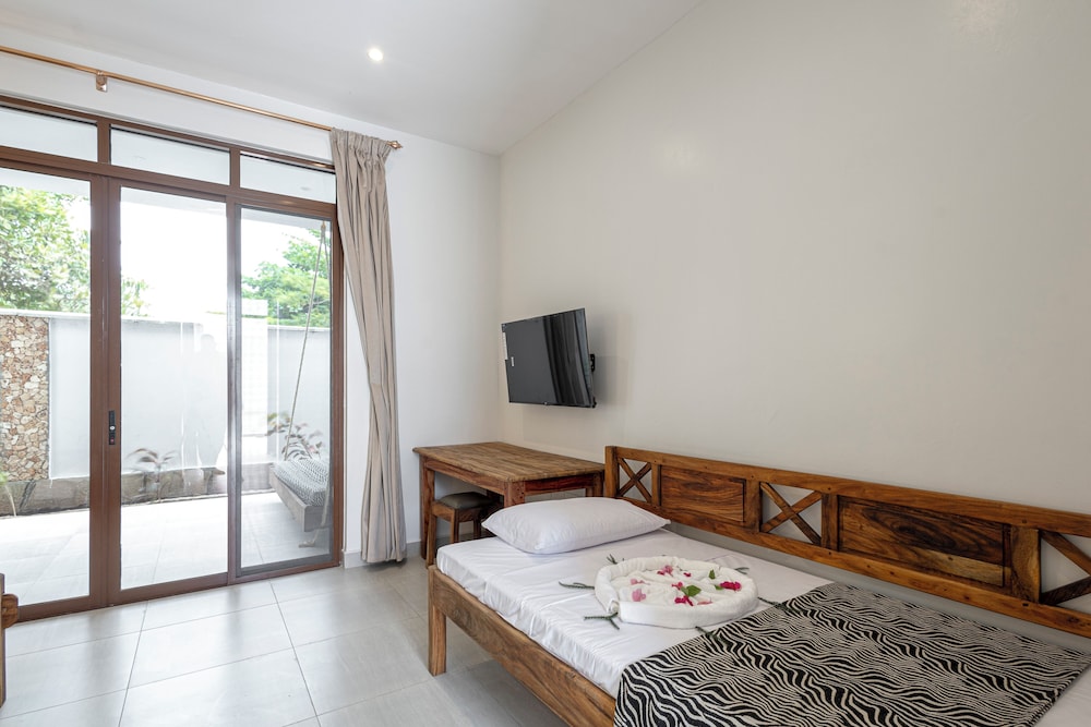 

Catania - Msambweni - YU Resort