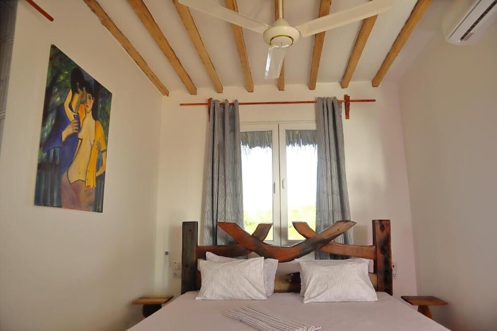 

Cagliari - Matemwe - Holiday Time Bungalows Zanzibar