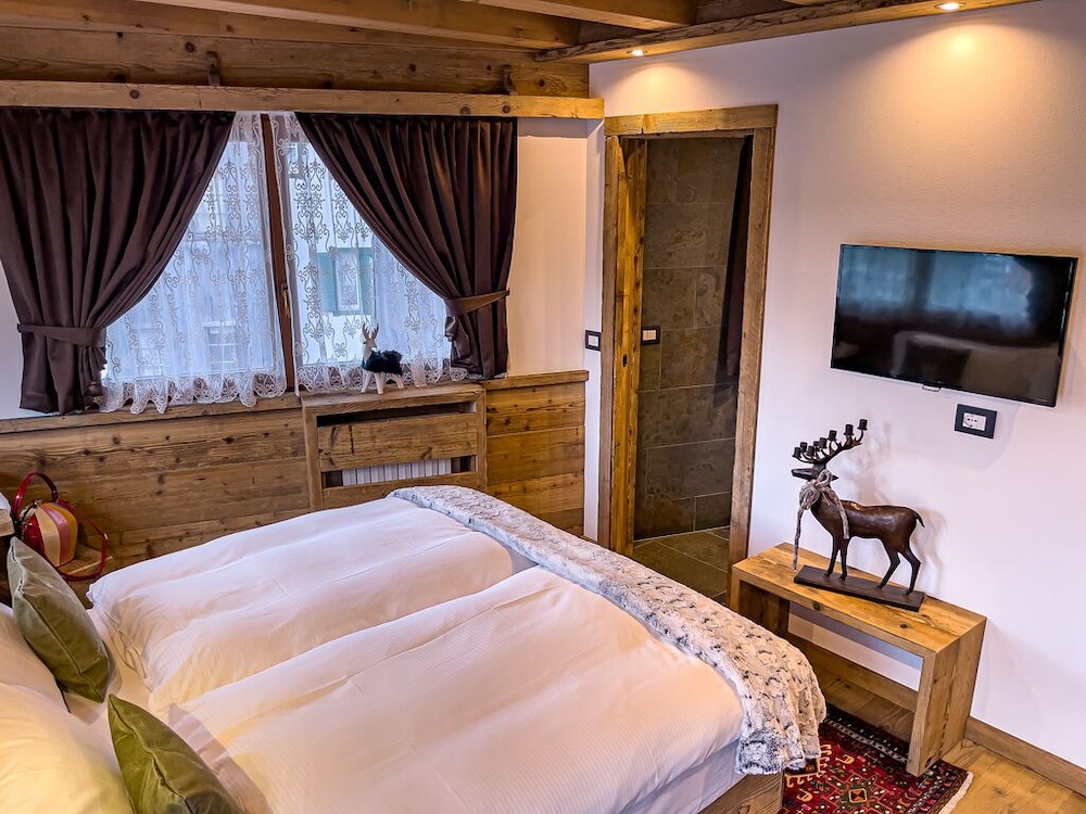 

Palermo - Cortina d'Ampezzo - Hotel da Beppe Sello