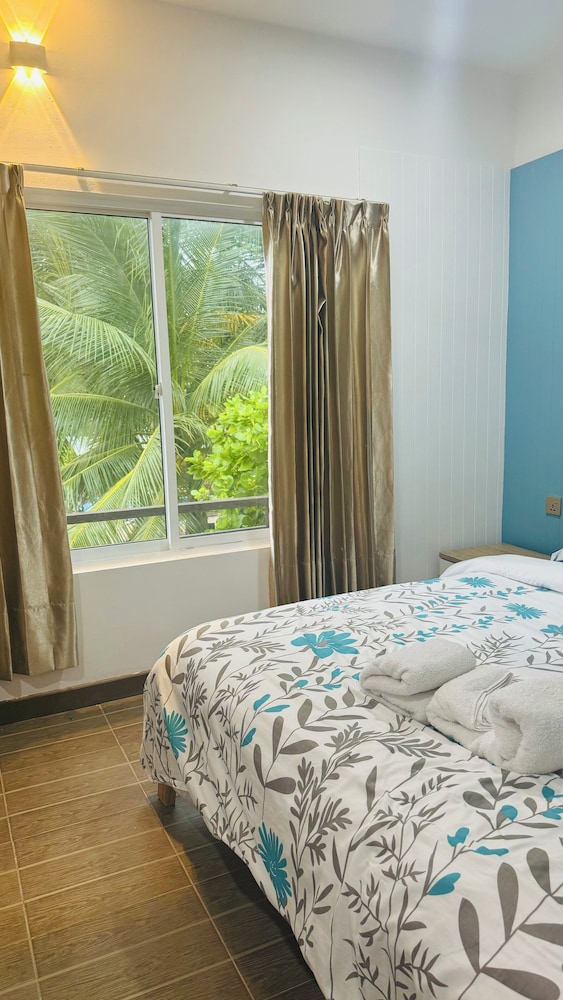 

Roma - Isola di Thulusdhoo - Wave Crest Retreat