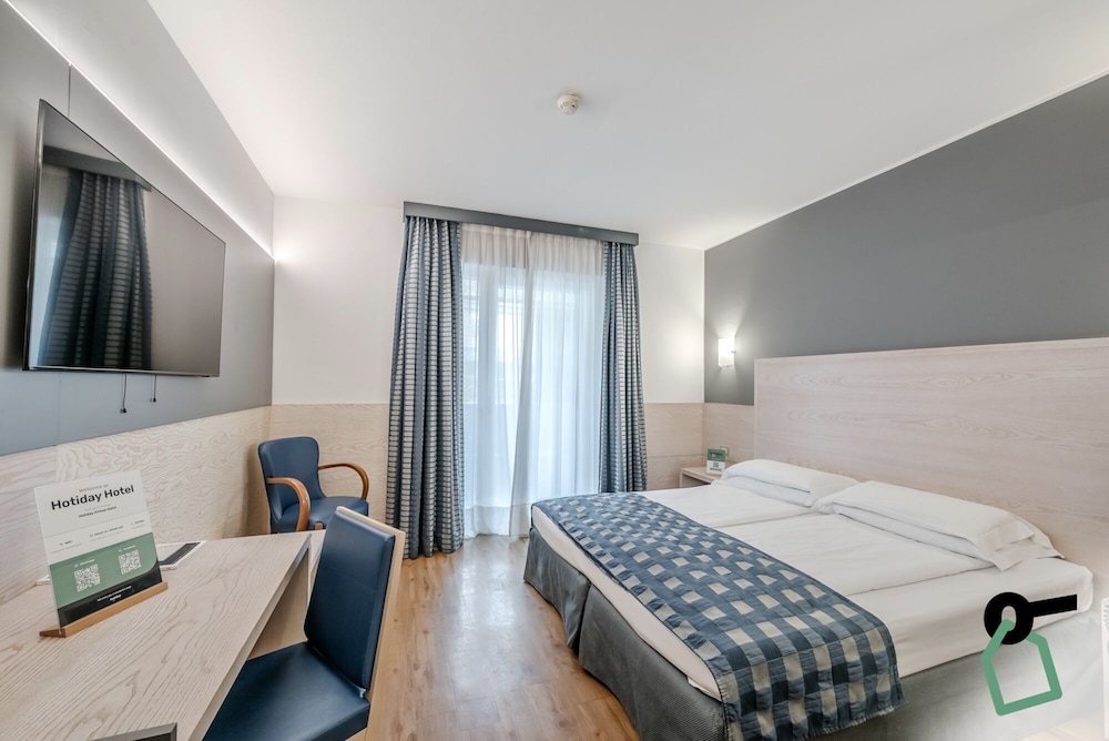 

Milano - Lago di Garda, Laghi Italia - HOTIDAY Room Collection - Torbole