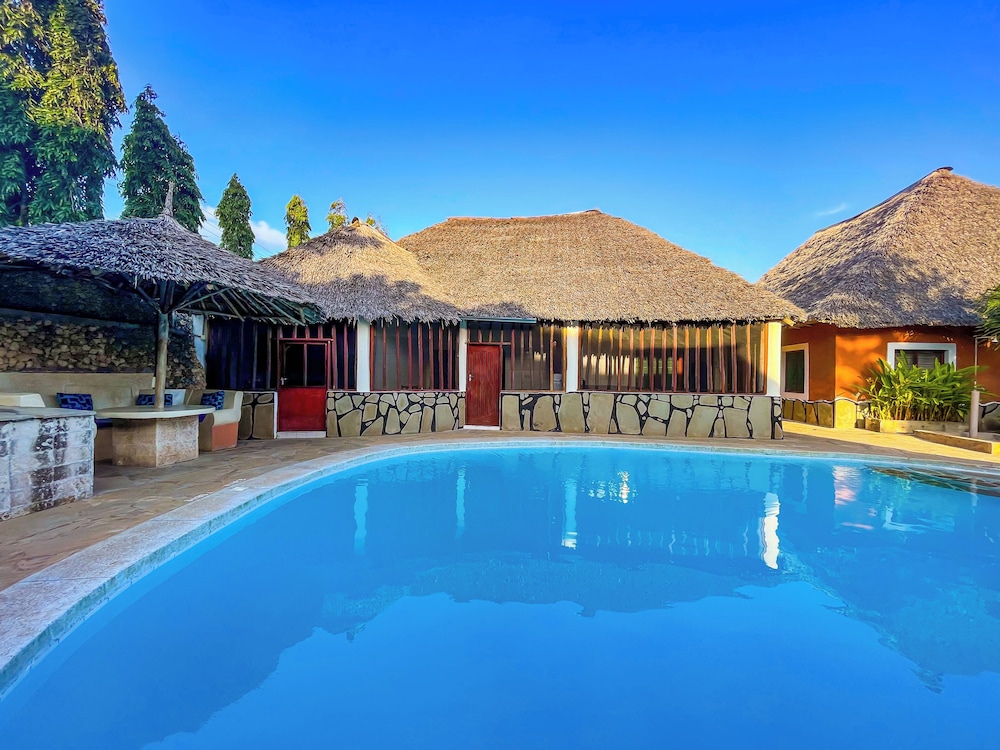 

Bologna - Diani Beach - Diani Campsite & Cottages