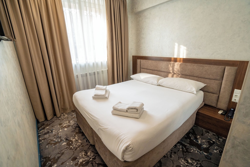 

Milano - Almaty - Hotel MILDOM Express