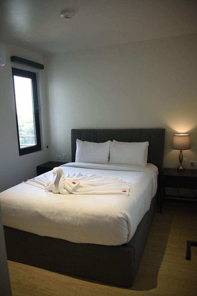 

Milano - Belize City - Grand Resort & Residences