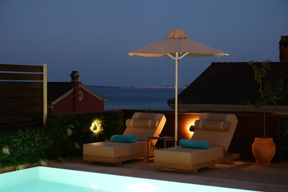 

Genova - Dassia - Corfelia Seaview Suites