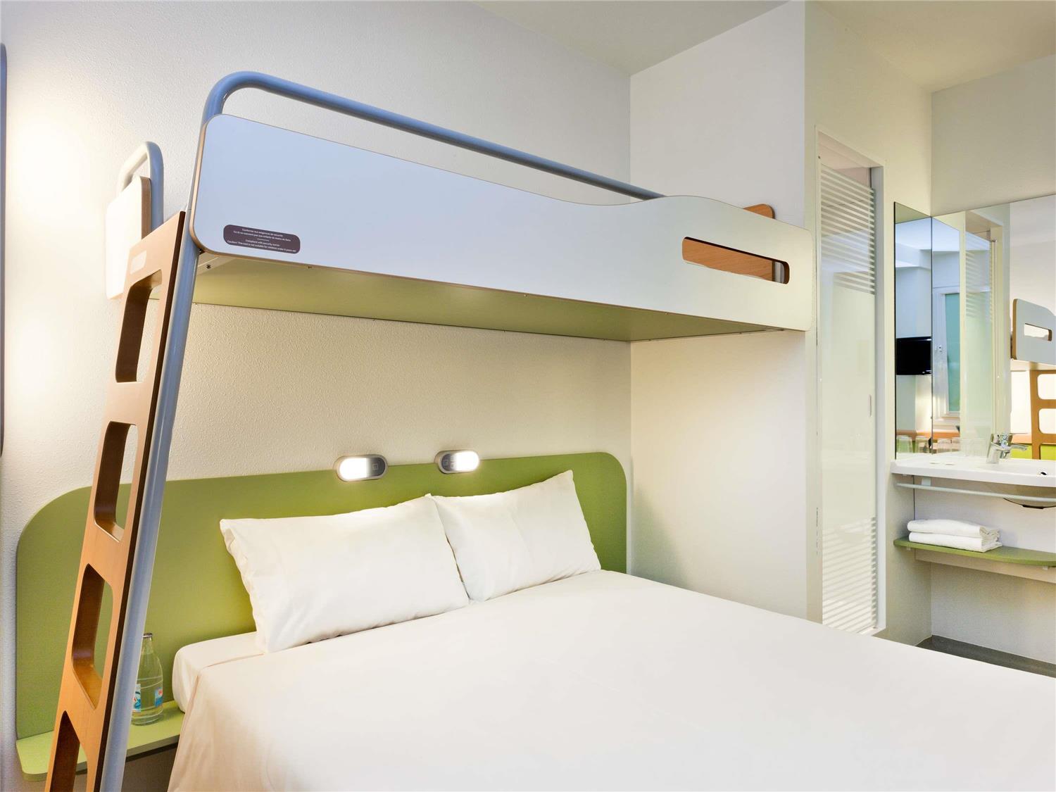 Room with double bed and single bed