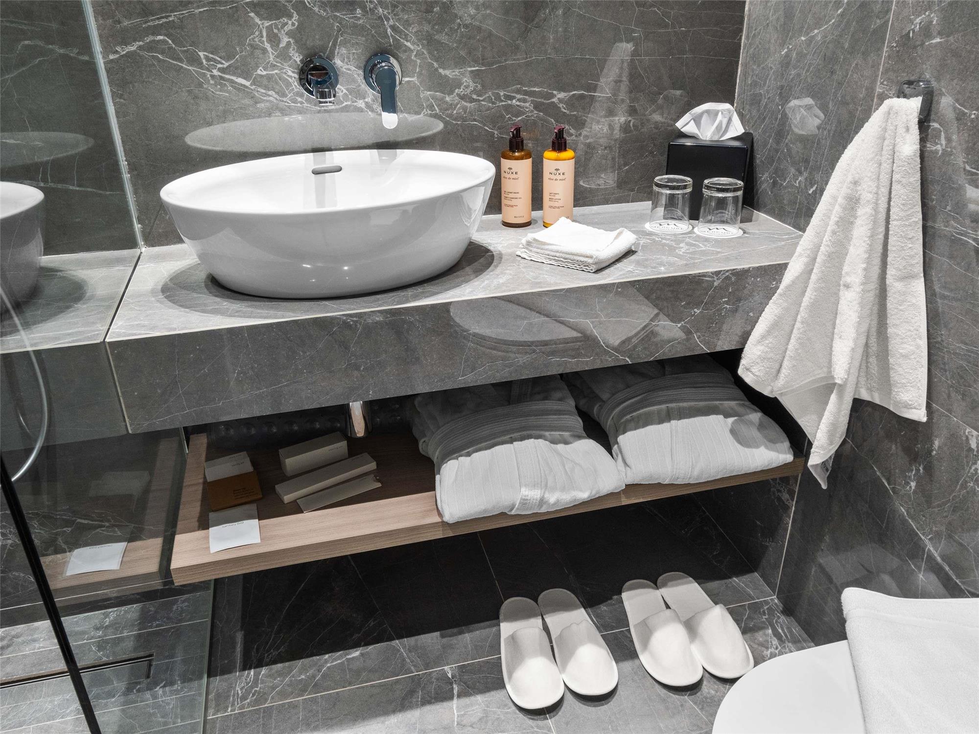 Superior room with double bed, sofa and balcony