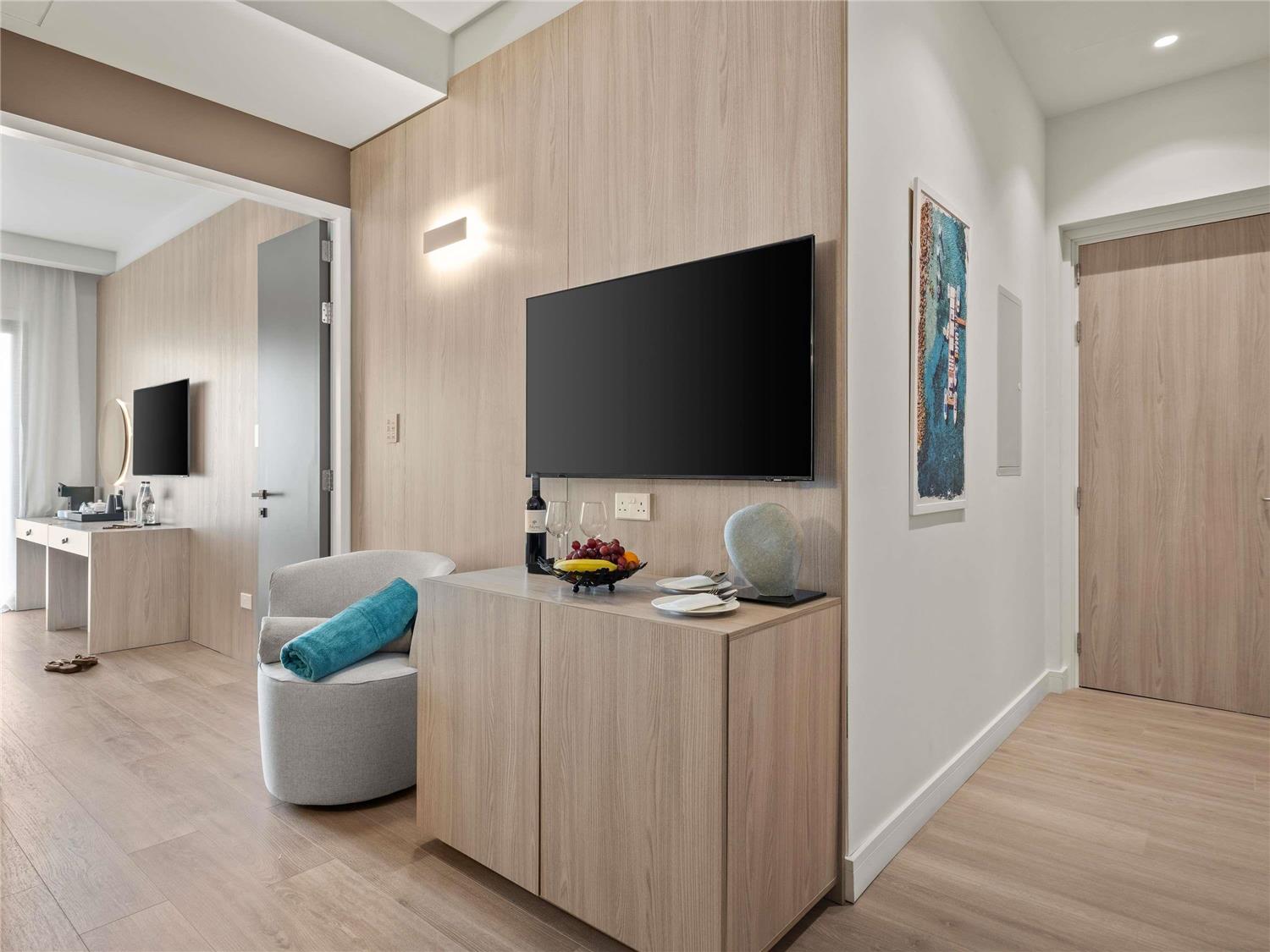 Superior room with double bed, sofa and balcony