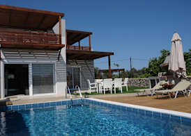 Next to Haraki beach , taverns bars & 10 to Lindos 4