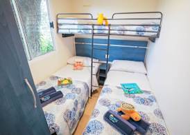 Happy Camp mobile homes in Camping Village Baia Paradiso 4