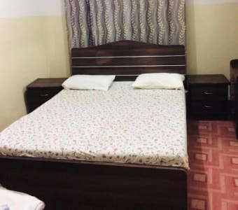 Four Squares Karachi - King Room with Two King Beds