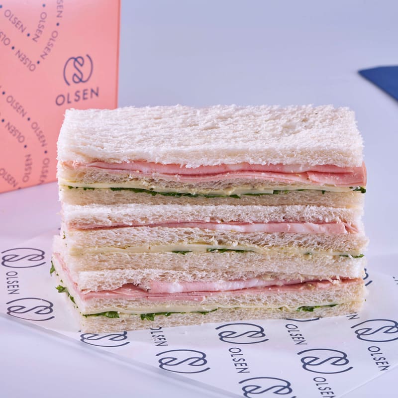 Sabor Mortadela, queso, rúcula y pesto — sándwich de miga Olsen
