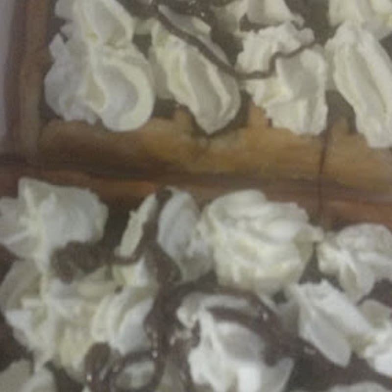 Tostada Mamasita (1ud)  Pan a Elegir Cubierto de Chocolate Cubano y Nata Montada