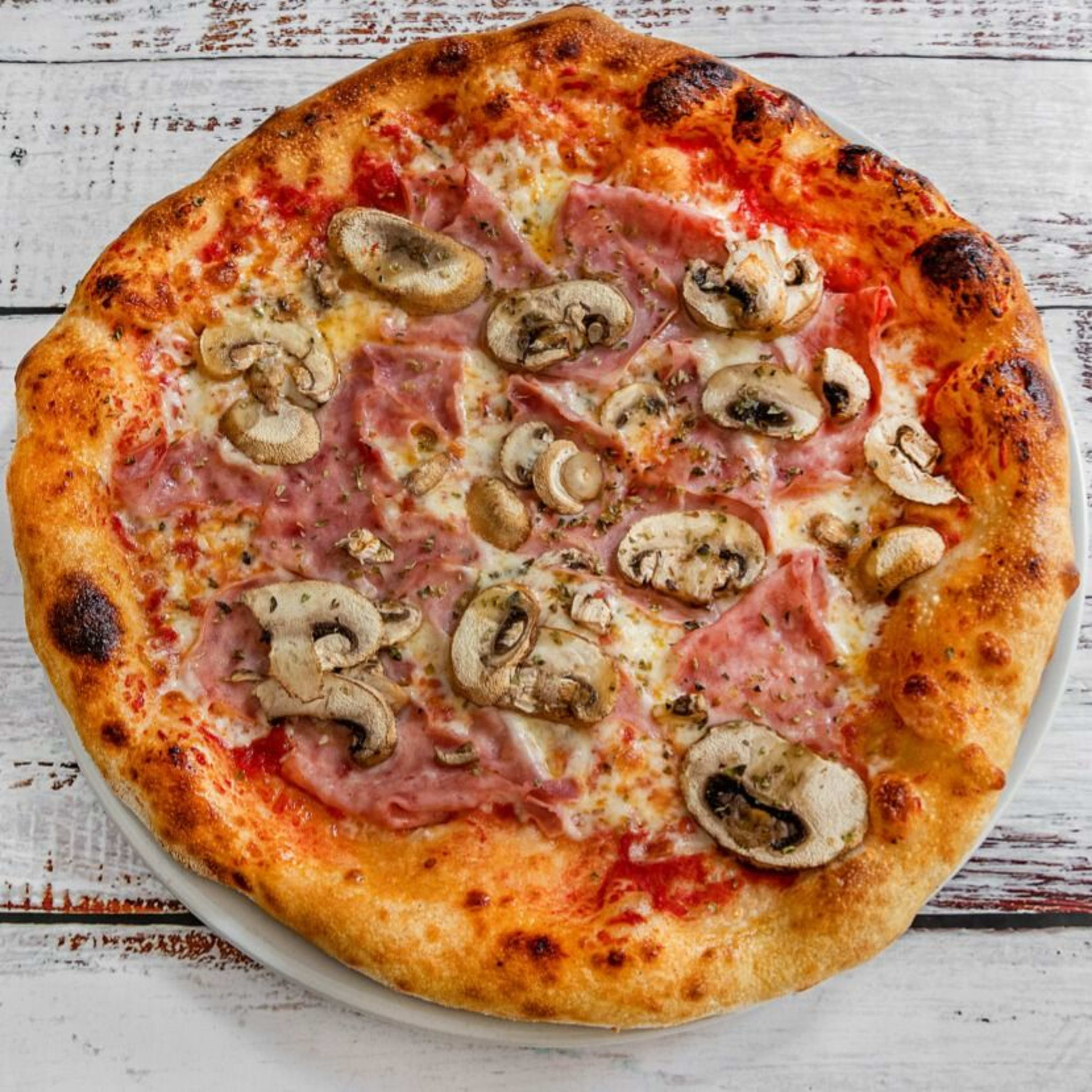 Prosciutto e funghi