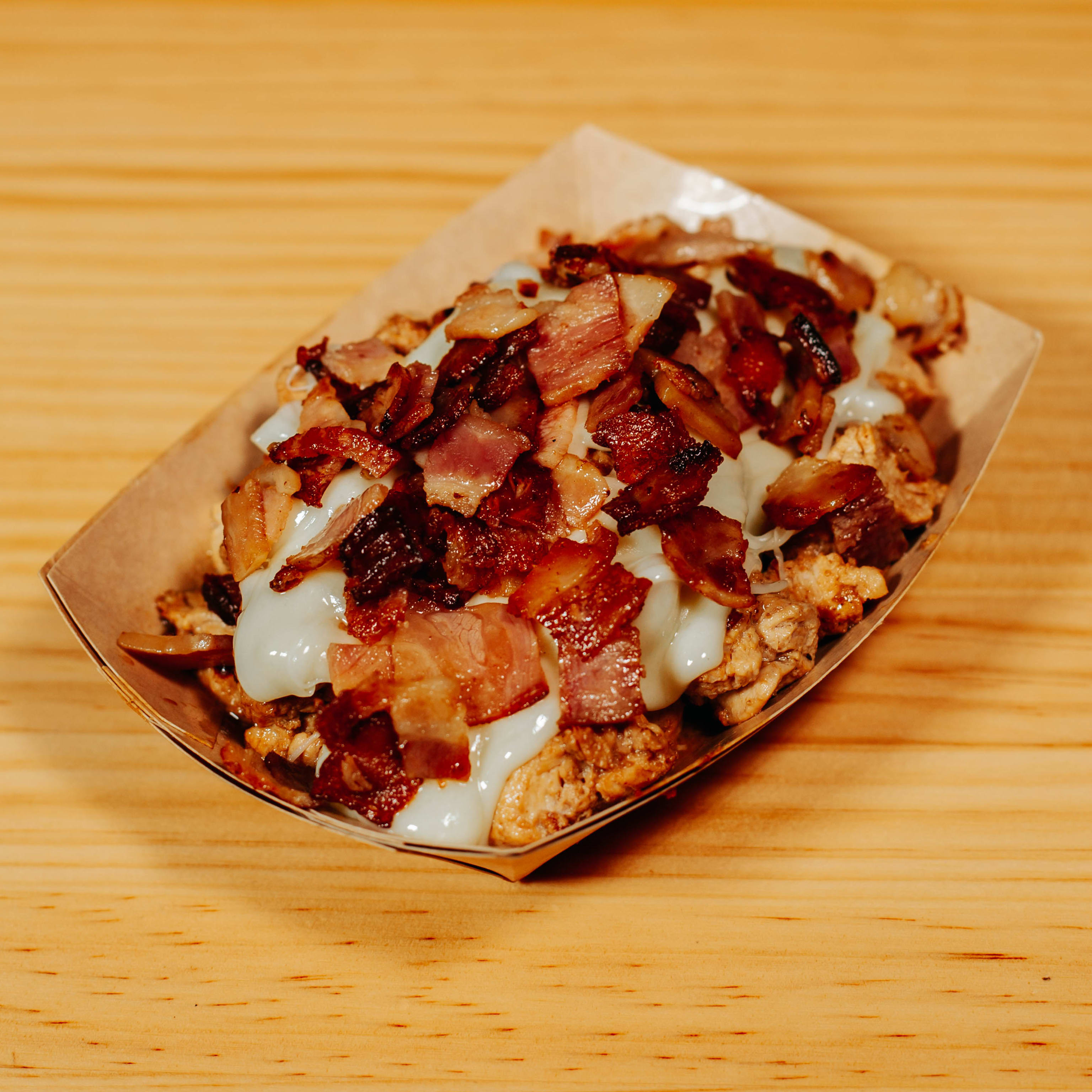 Pollo marinado con queso raclette DOP y bacon