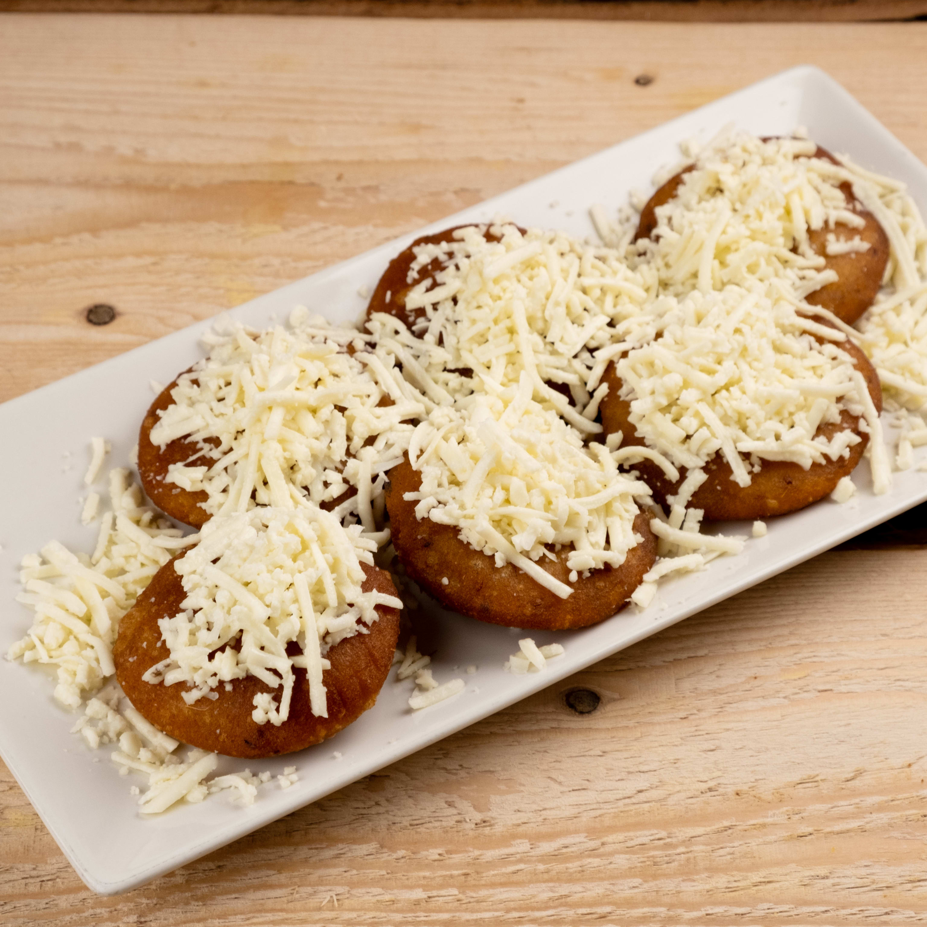Arepitas Dulces con queso rallado