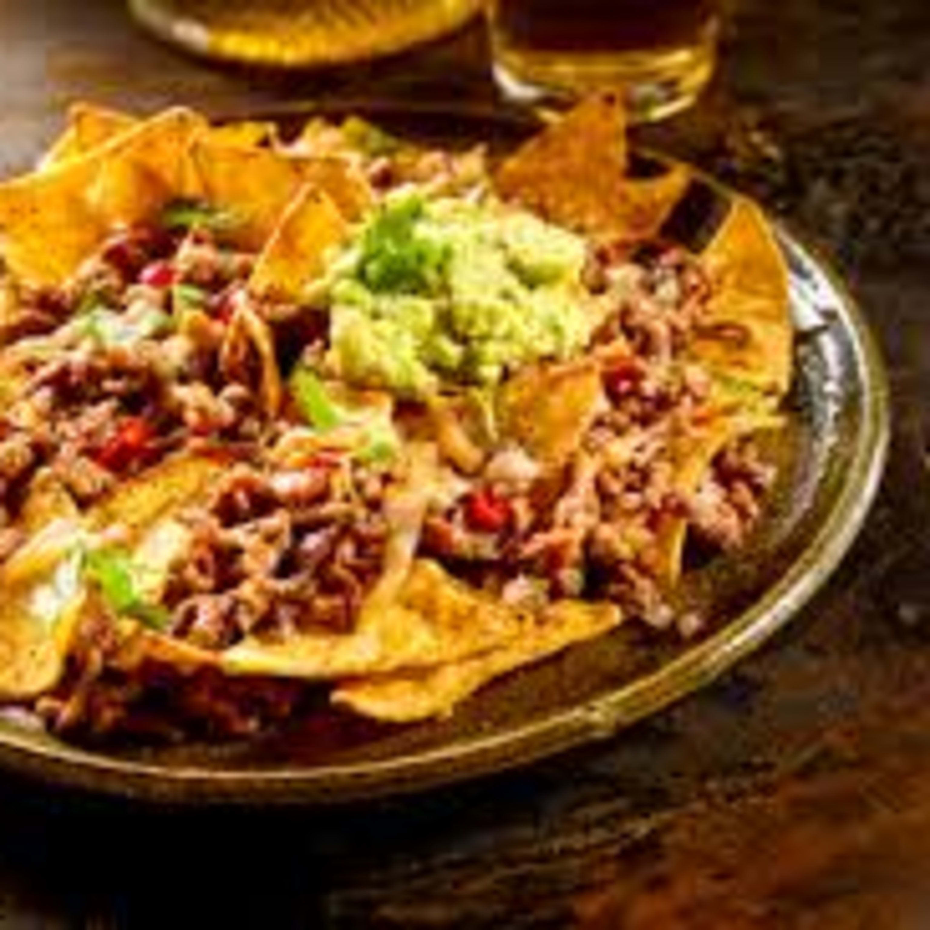 Nachos mexicanos con mezcla de varios quesos