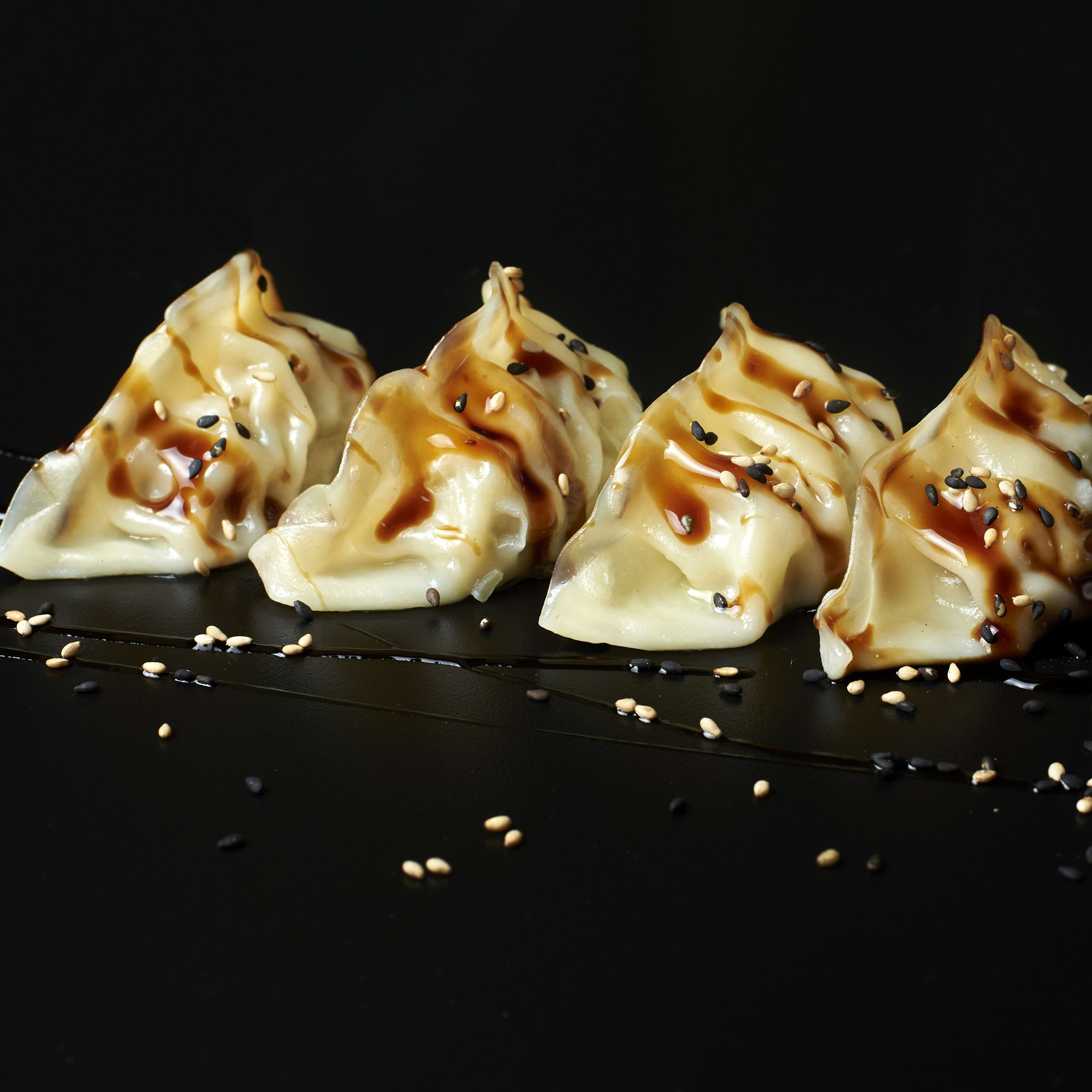 Gyozas gratinadas de pollo y verduras