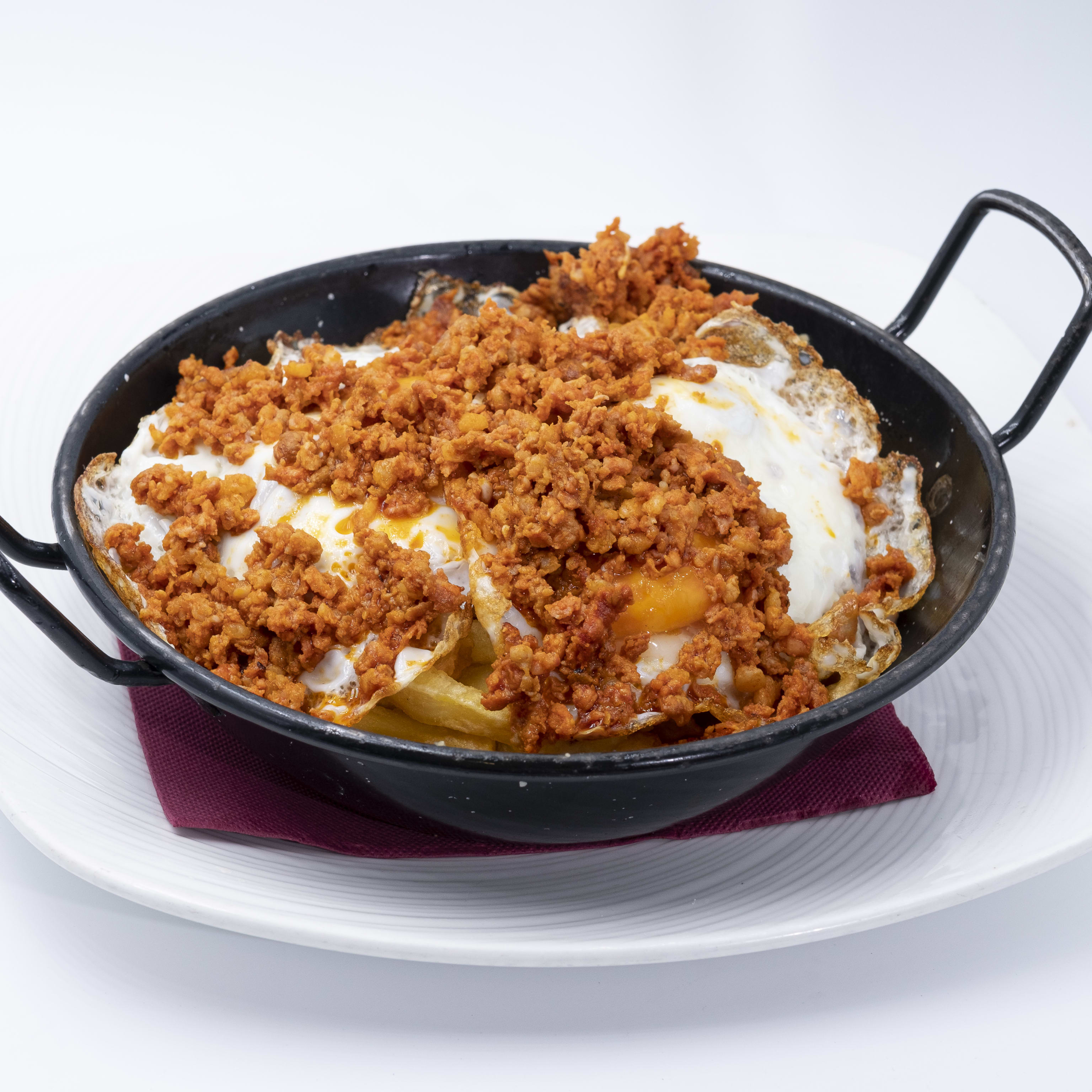31. Sartén de patatas, jijas y huevos