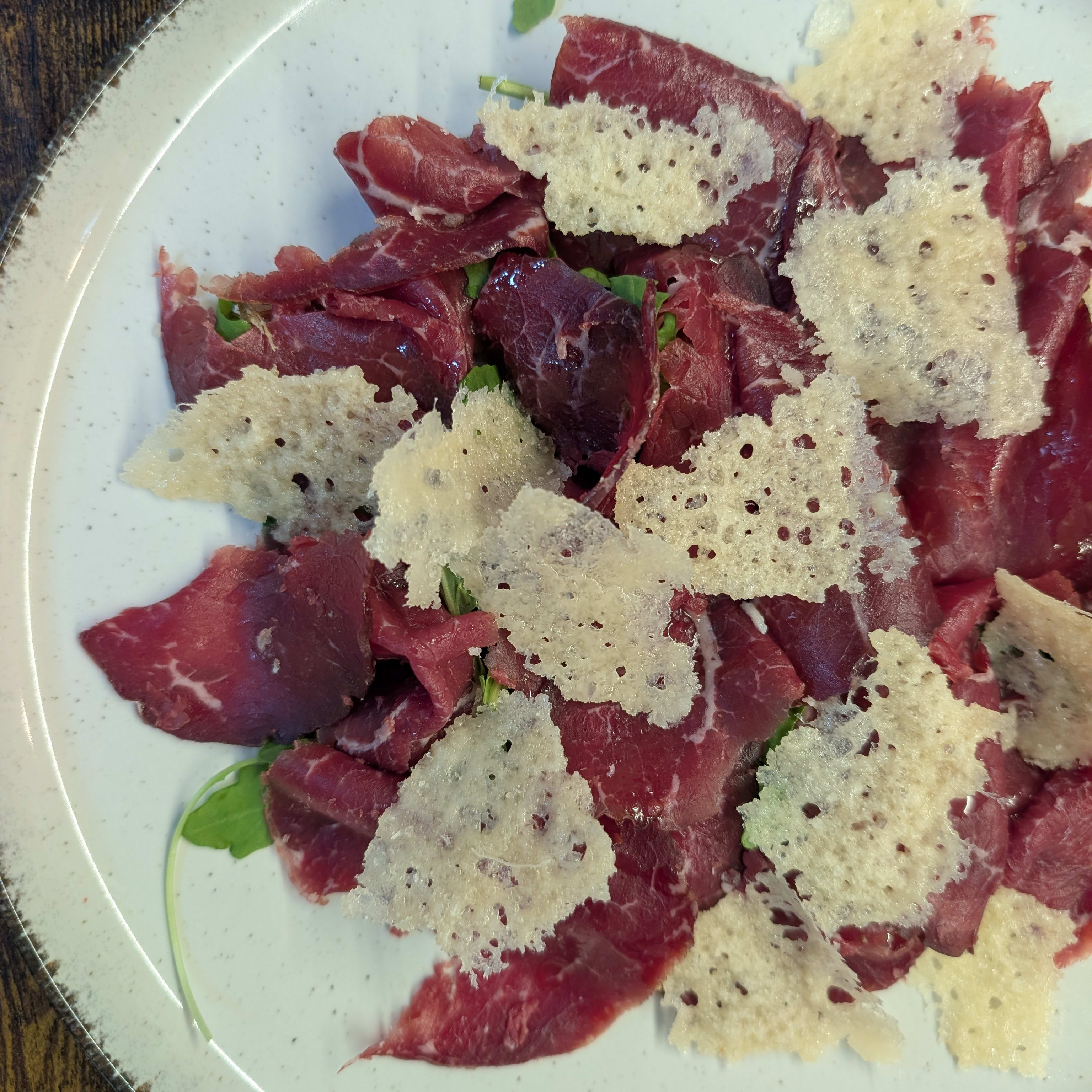 Bresaola, rúcula y parmigiano