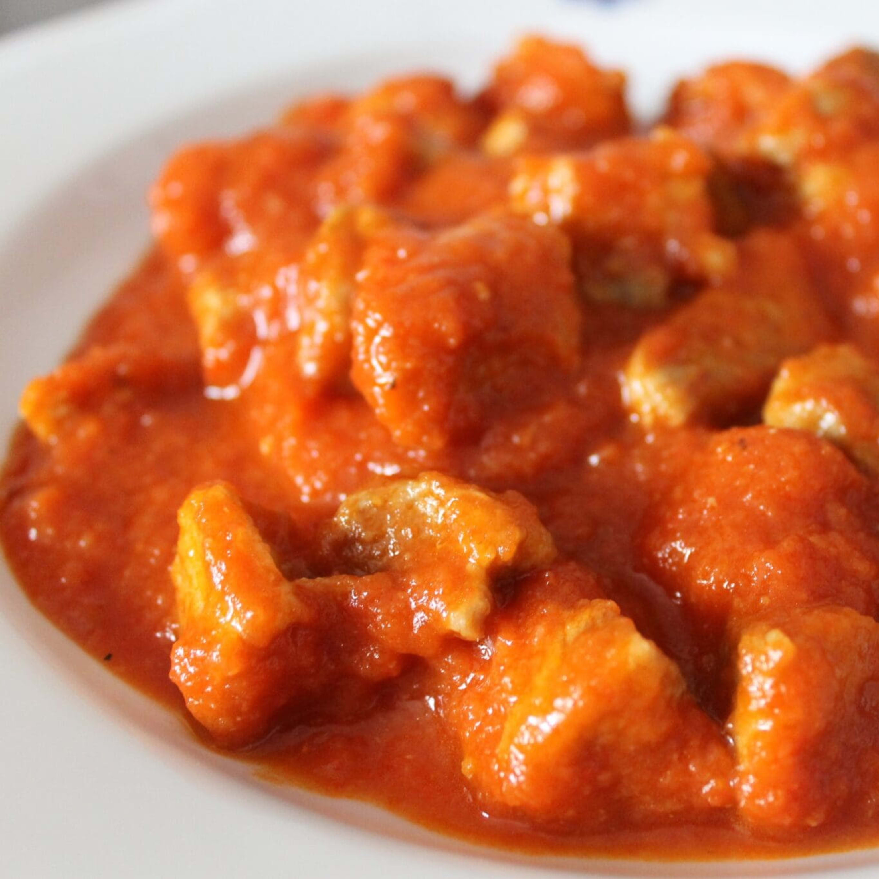 Carne con tomate (tienda)
