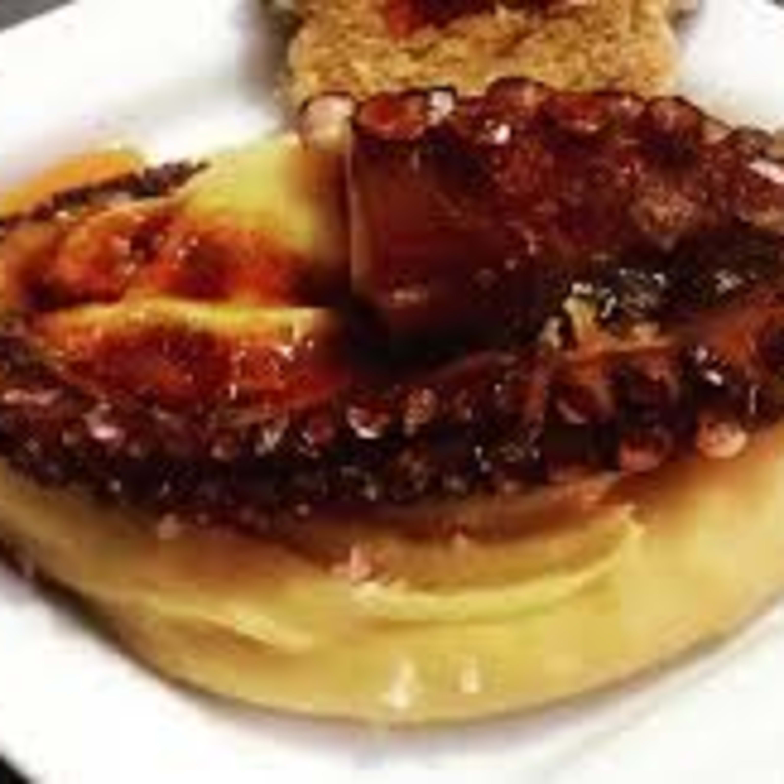 Pulpo a la brasa con pure patata trufado