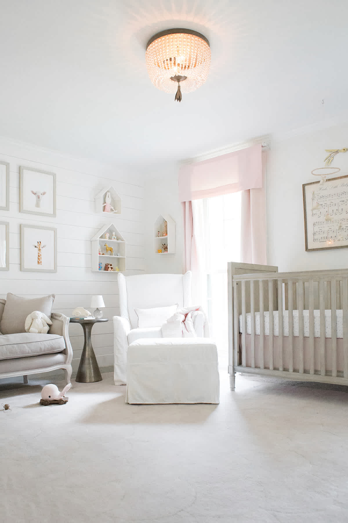 a classic polished pink nursery for a baby girl lay baby lay