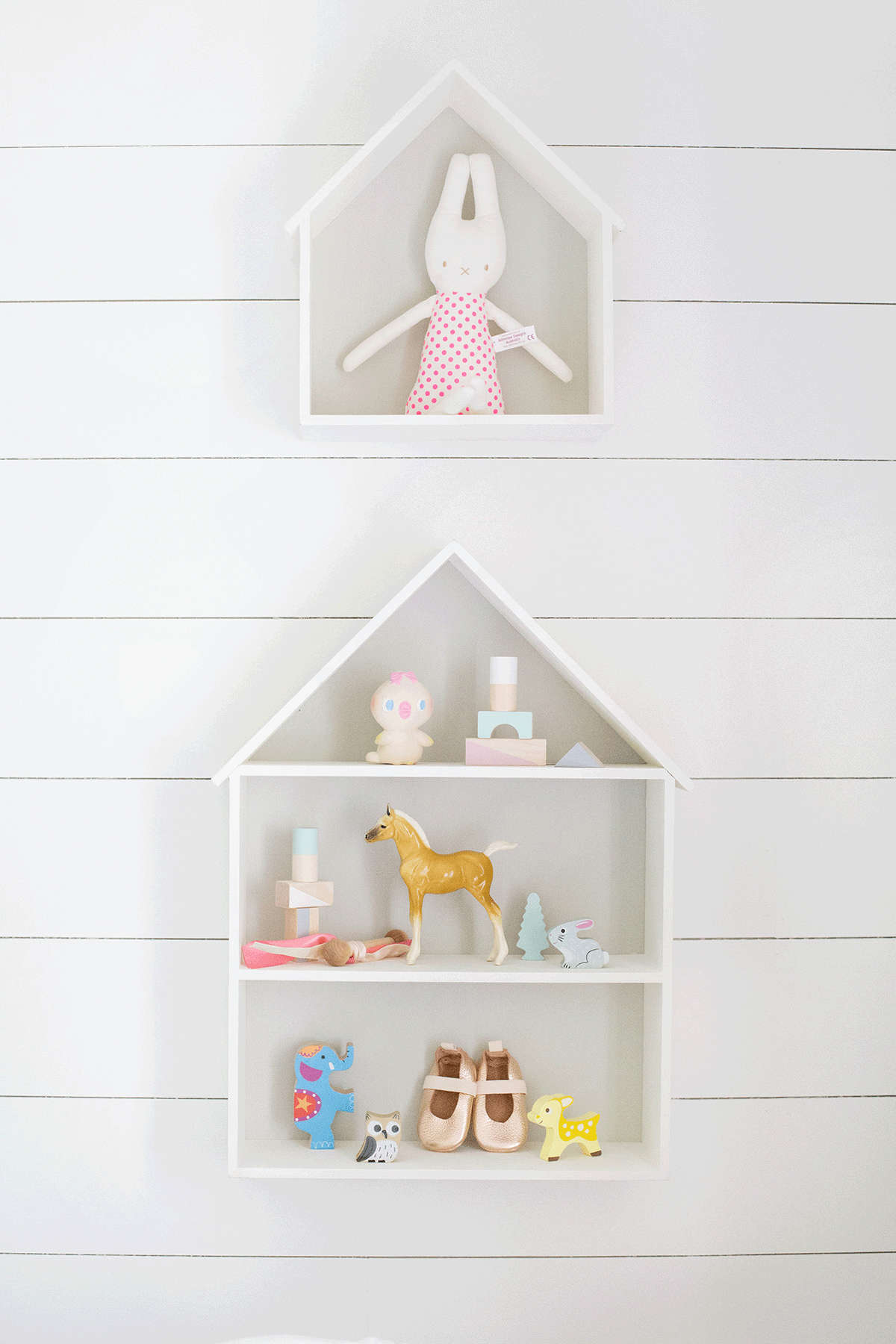 A Clic Polished Pink Nursery For Baby Lay Baby Nursery Shelf Ideas